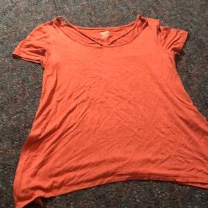 orangish pink top